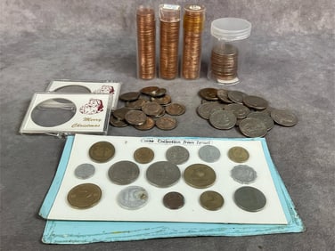 Three tubes of 1964 uncirculated pennies, sixteen Kennedy bicentennial half dollars, fifteen 1964