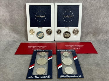 Four sets of US Bicentennial silver proof sets, two in red envelopes and two in boxes. Each set has