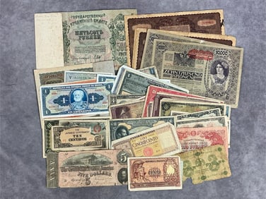 One 1864 Richmond VA Confederate States of America 5 dollar bill, and forty four foreign bills.