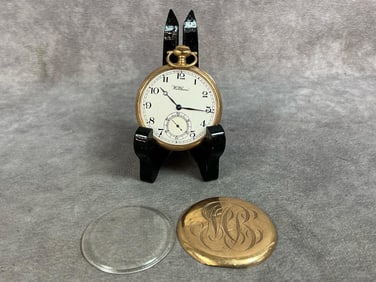 Early 1900s 14kt gold open face pocket watch. Face is marked Waltham, inside back cover is marked