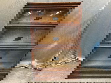 Early 20th century Arts and Crafts barrister oak bookcase. Wavy original glass and original brass