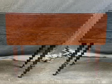 Late 19th early 20th century Sheraton style swing leg drop leaf cherry table. Bench made out of