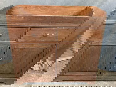 20th century bench made walnut dry sink with two drawers over two paneled doors. Nailed drawers with