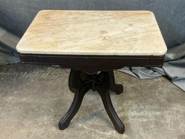 Late 19th century Victorian Eastlake marble top side table. Old stained finish. Some stains to