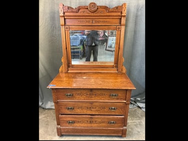 Late 19th century Eastlake oak dresser with mirror. Gouge carved foliage design to drawers and upper