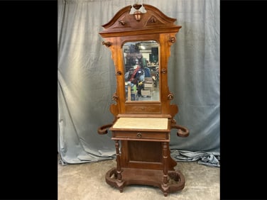 Late 19th century Victorian carved walnut hall tree with one drawer and mirror. Missing back board