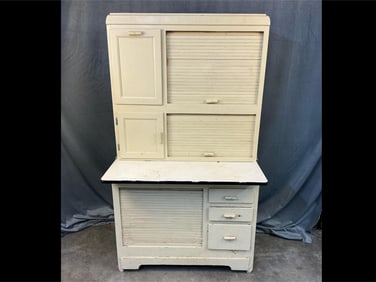 1930's cream painted Hoosier Cabinet with flour sifter bin and two roll top doors over porcelain top