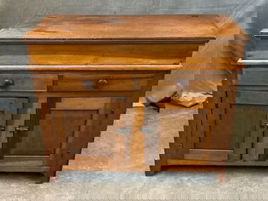 Mid 19th century cherry lift top dry sink over two drawers and two lower paneled cupboard doors.