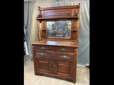 Early 20th century Eastlake chip carved oak sideboard with mirror. Three pen and cove construction