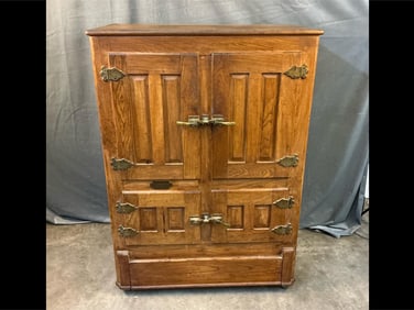 Early 20th century Belding Hall Porcelain lined oak Refrigerator ice box with manufacture's brass