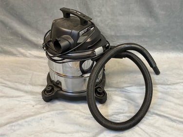 4.0 HP Wet or Dry 5.0 Gallon Vacuum. Stainless Steel Tank. Used, In Operating and Good Condition.