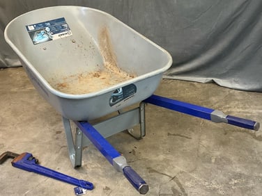 6 Cubic Foot Heavy Duty Wheelbarrow and 24 Inch Cast Iron Pipe Wrench. Both Used, Showing some Rust.