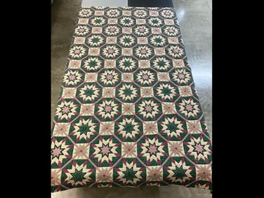 1990s hand stitched quilt with pinks and greens. In good condition. Measures 105 inches long x 82