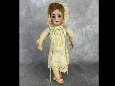 Early 20th century Simon Halbig Bisque head doll with C.M. Bergman body. Original clothing. Some