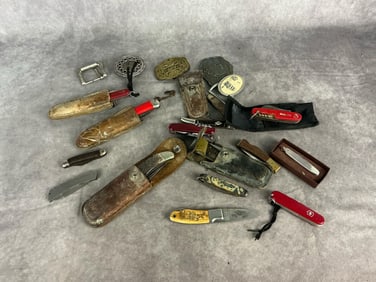 Mid 20th century assortment of vintage knives, sheaths, and belt buckles. Five belt buckles and