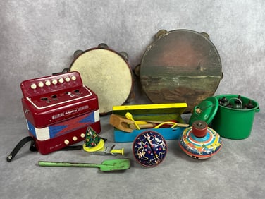 Nine early to mid 1900s toys. Skin and wood tambourine with seascape, and skin and metal tambourine.