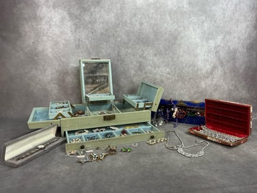1950s to modern jewelry. Three jewelry cases with assortment of rhinestone necklaces, pins,