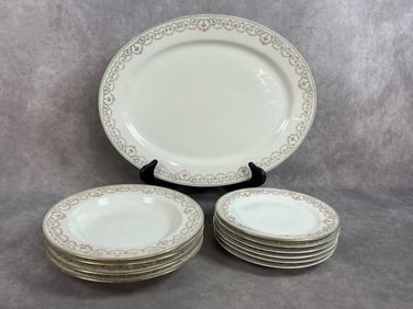 Eleven mid century plates made by Bawo and Dotter's Elite works in Limoges, France. Miniature pink