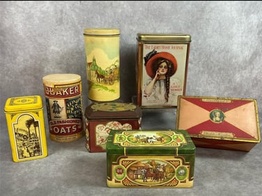 Seven early to mid 1900s tins. Includes biscuits and candy tins and Quaker Oats box. Rust present