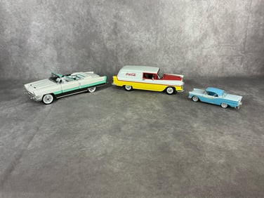 Late 20th century lot of three Diecast cars. 1955 Road Signatures convertible Packard Caribbean.