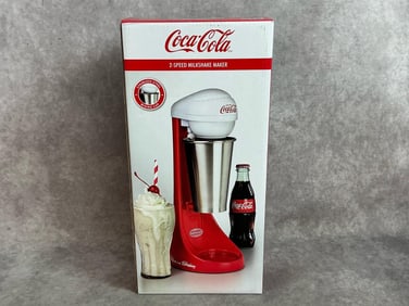 Modern 2 speed mixer. Stainless steel cup and rod on Nostalgia base. Unopened with tamper seal. Box