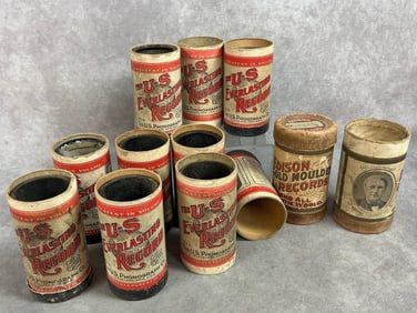 Ten record cylinders and two empty cylinder cans from early 1900s. Made by US Everlasting Records