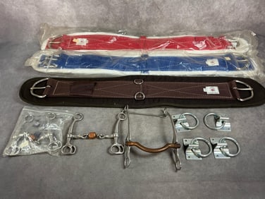 Modern cinches and horse bits. Three Tuffy, by Big Horn, western cinches with stainless hardware.