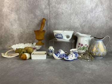 Lot of assorted items including Delft shoes and mini vase, Limoges soup dish, stone elephants and