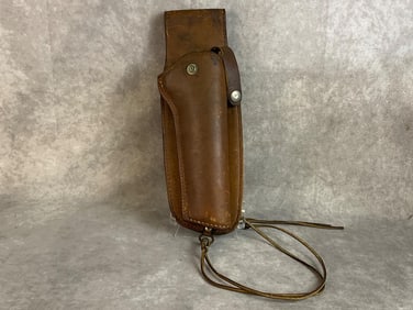 World War II era leather revolver belt holster appears to be sized for 45 cal revolver or larger.