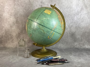 George F. Cram Company 12 inch world globe made in Indiana, two glass ink wells, and multiple