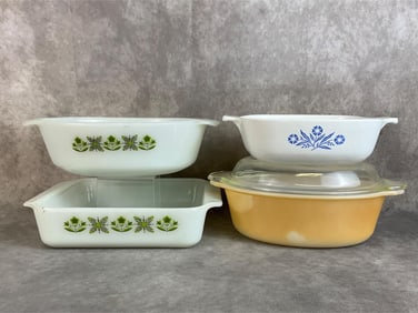 Lot of three Anchor Hocking Fire King casserole dishes and one CorningWare casserole dish. Patterns