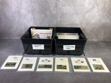 Two containers of commemorative first day covers from Japan. Approximately 200 in total with all in