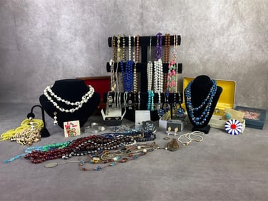 Large lot of costume jewelry including Sarah Coventry, Avon, and more. All in fair to good