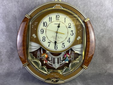 Seiko Umbrella Dance Melodies in motion musical wall clock. In good condition, tested and working.