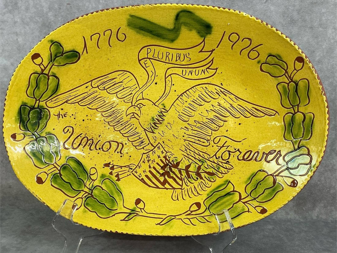 1975 Bicentennial limited Breininger Pottery platter. Redware slip glazed, Pennsylvania: 1975 Bicentennial limited Breininger Pottery platter. Redware slip glazed, Pennsylvania Dutch-inspired art, marked number 111. In good condition with some crazing in spots. Measures 15 inches wide x 1