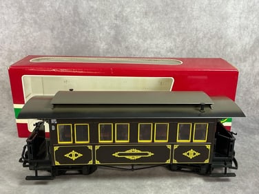 Modern age train car. LGB G scale model train number 3061 passenger car. Top of car has fading,