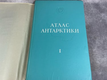 1966 atlas of Antarctica in Russian, in original dust jacket and box. Good condition. Measures 15.5