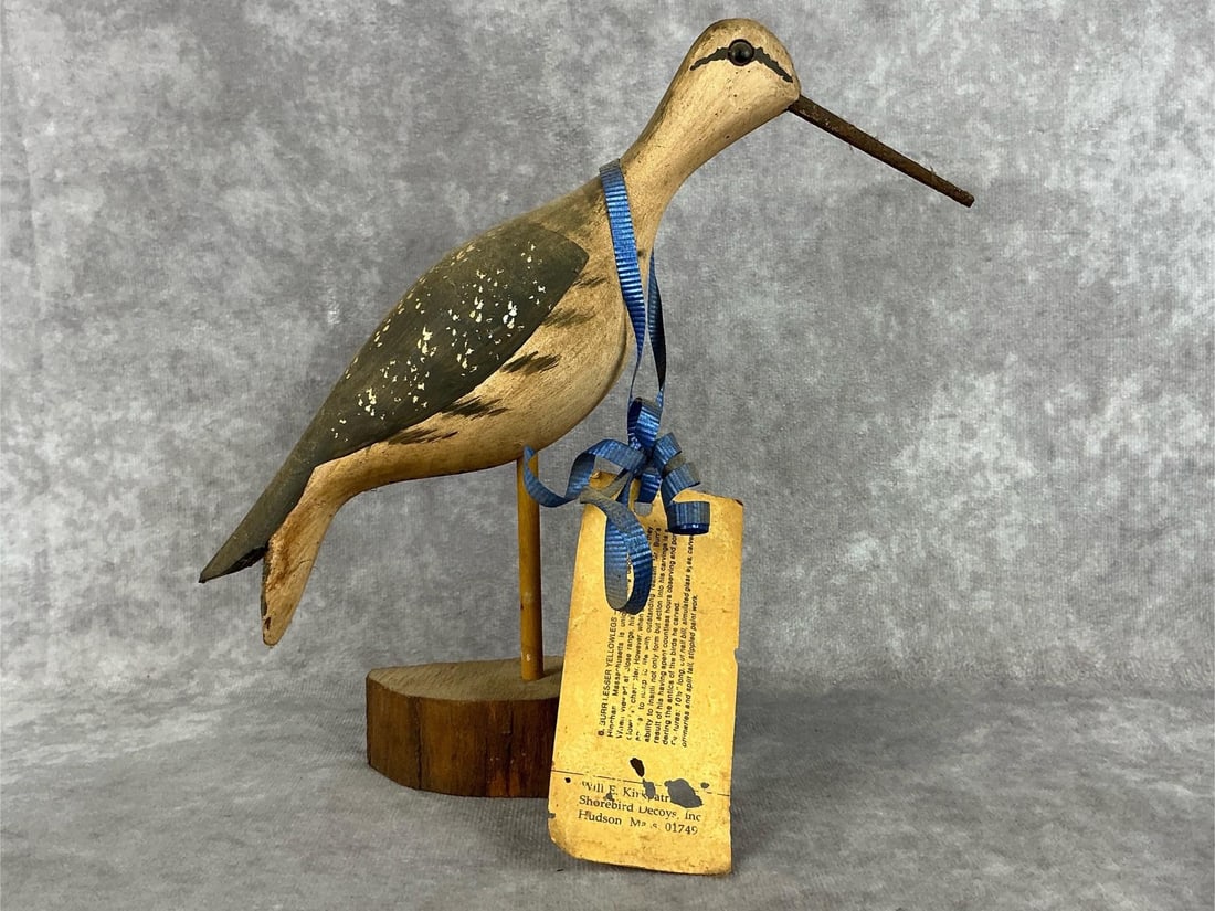 Will E. Kirkpatrick Shorebird: 1981 carved decoy shorebird on wooden base signed/branded "WEK 81" on bottom by Will E. Kirkpatrick of Hudson, Massachusetts. Stippled paint, glass eyes, and antique cut nail for bill. Good Condition.