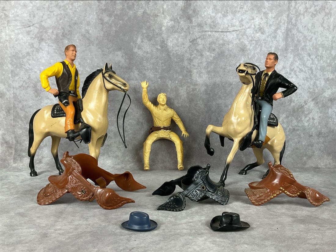 Hartland Plastic Western Toys: Circa 1960 plastic Hartland toys - Matt Dillon on saddle and horse figure, Bret Maverick on saddle and horse figure, Roy Rogers without horse, three saddles and two hats. Maverick and Rogers missing s