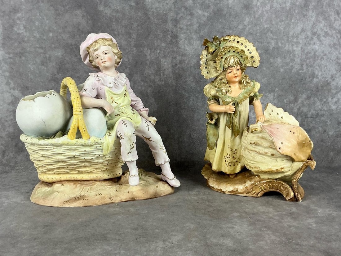 Porcelain Figurine Vases: Two late 19th century vases. Smaller Austrian porcelain vase marked Ernst Wahliss - girl with flower bloom. Larger German bisque double vase marked Rudolstadt - boy with eggs in basket. Larger boy vas