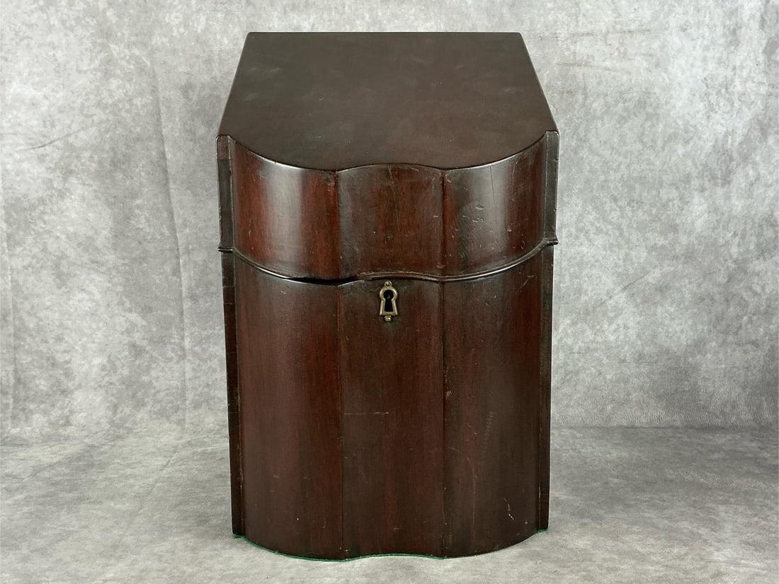 George lll Mahogany Knife Box: Circa 1810 George lll mahogany knife box. Hinged lid, fitted interior, and lock without key. Missing small section of front lid molding. Otherwise good condition, wear from use. Measures 9.25 inches w