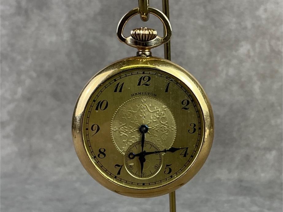 Hamilton 10kt GF Pocket Watch: 1920s Hamilton 10kt gold filled open face pocket watch. Inside plate stamped Keystone, watch case, 10k, gold filled, serial number 9571195. Watch runs for 10 seconds and in good condition. Total weigh