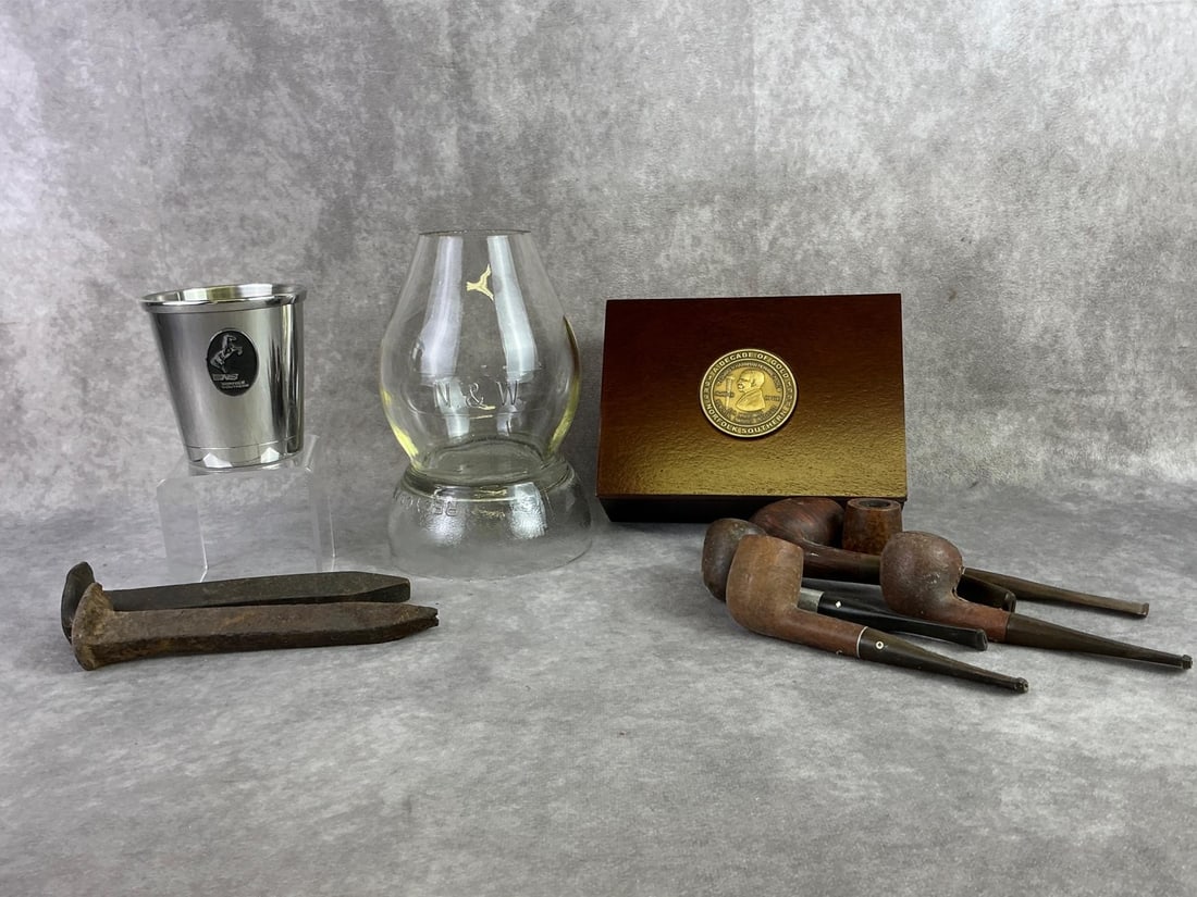 Norfolk Southern Treasures: Norfolk Southern collectibles including wooden box, cup, nails, Norfolk Western lantern globe, and wooden pipes. All in good condition. Lantern measures 4.75 inches in diameter x 7.5 inches tall.