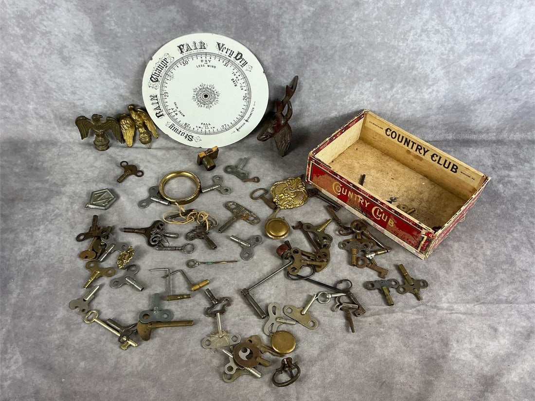 Collection of Antique Clock Keys, Pendulums, Furniture Hardware, and a Porcelain Barometer Dial (1 of 8)