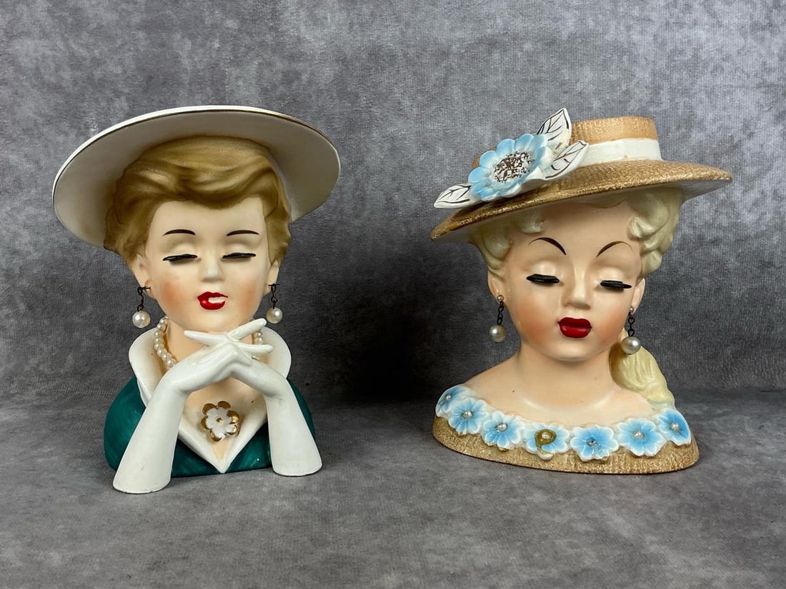 Rubens Lady Porcelain Head Vases: Two MCM Rubens Lady Head vases. Both with porcelain eyelashes and faux pearl earrings. Both marked with the Rubens green stamp. One #495 with faux pearl necklace and one marked #499B Japan with the Ru