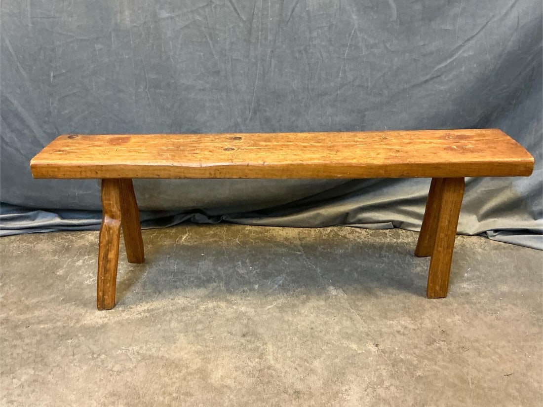 Plank Bench: Mid 19th century plank bottom bench. Pine seat and oak thru tenoned legs. Bench has some wobble, good condition. Measures 44.5 inches wide x 8.5 x 15 inches tall.