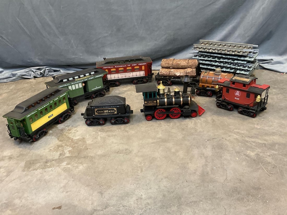 Jim Beam Railroad Decanters: 1960's-1970's Jim Beam Central New Jersey Railroad porcelain decanters. One plastic locomotive , coal car, dining car, log car, tank car, caboose, and two passenger cars. Eight sections of railroad tr