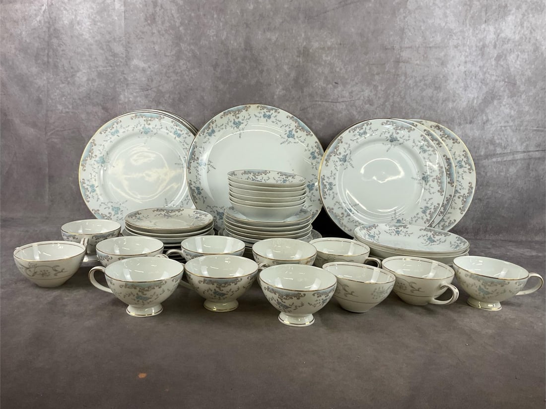 Imperial China Dinnerware: Late 20th century Imperial China dinnerware marked "Imperial China Designed by W. Dalton Japan Seville". One large round platter. Eight dinner plates. Four tea cups marked "Meito China Japan". Eight f