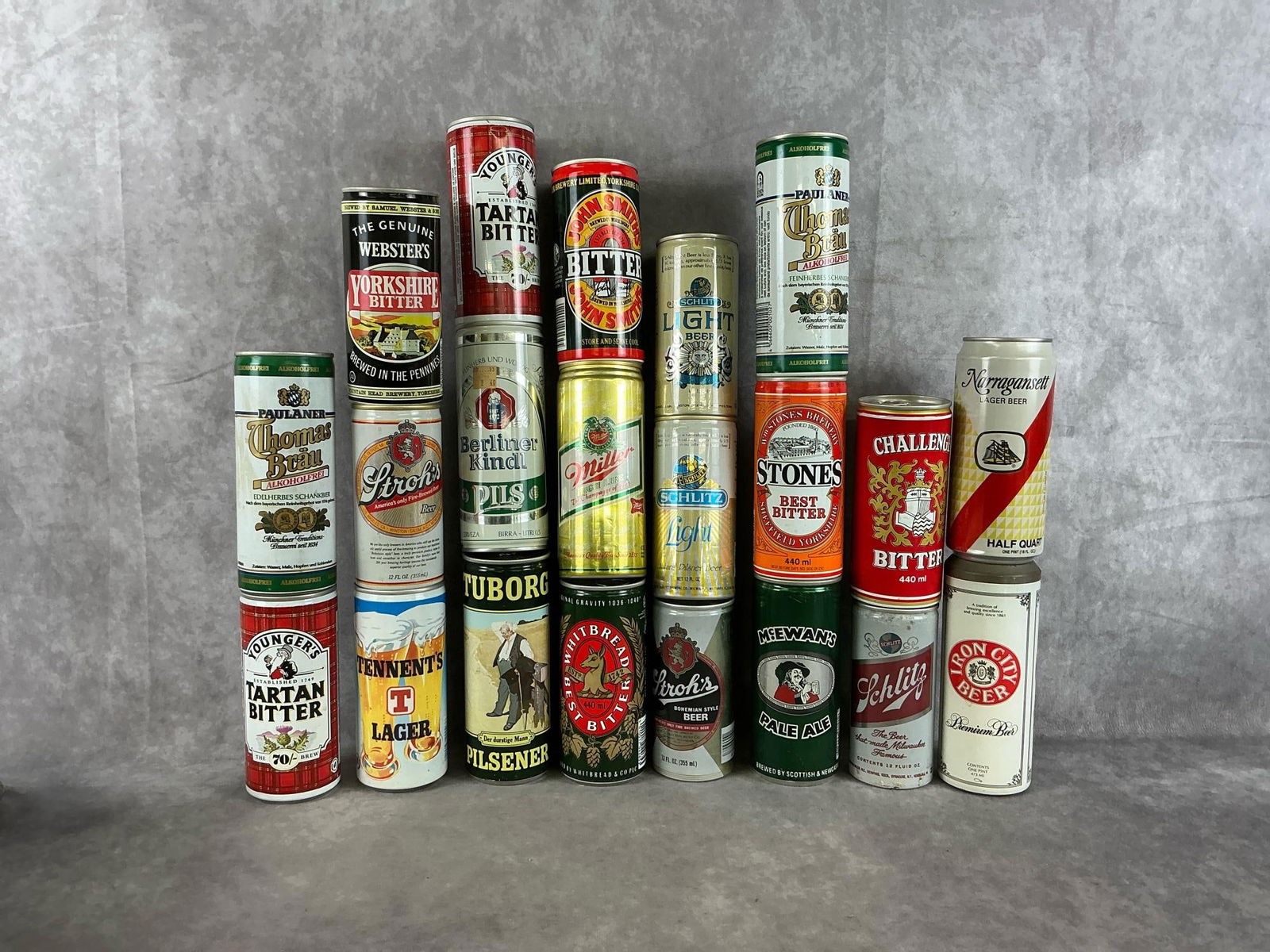 Collectible Beer Cans: An assortment of 1970's - 1980's pull tab top domestic and import vintage collectible beer cans. Twenty seven total beer cans. Includes Iron City, Miller, McEwans, Whitebread, Schlitz, Stones, Narraga