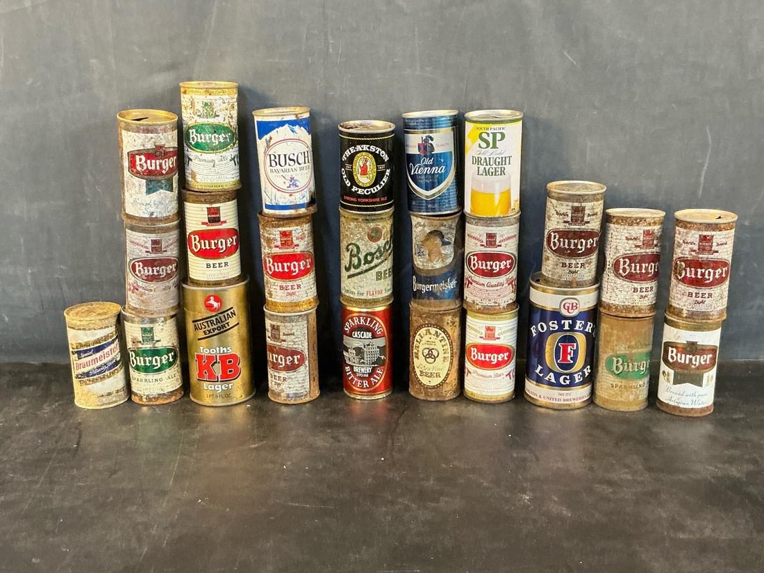 Collectible Beer Cans: An assortment of 1970's-1980's pull tab top collectible vintage domestic and imported beer cans. Twenty seven total. Rusted condition. Foster's can measures 3.25 inches in diameter x 6 inches tall.